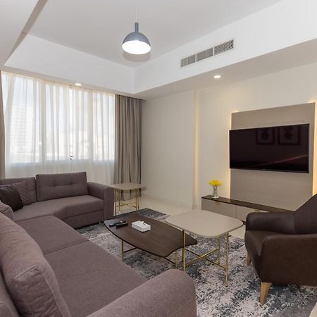 Platinum Coast Hotel Apartments Fujaira Esterno foto Living room