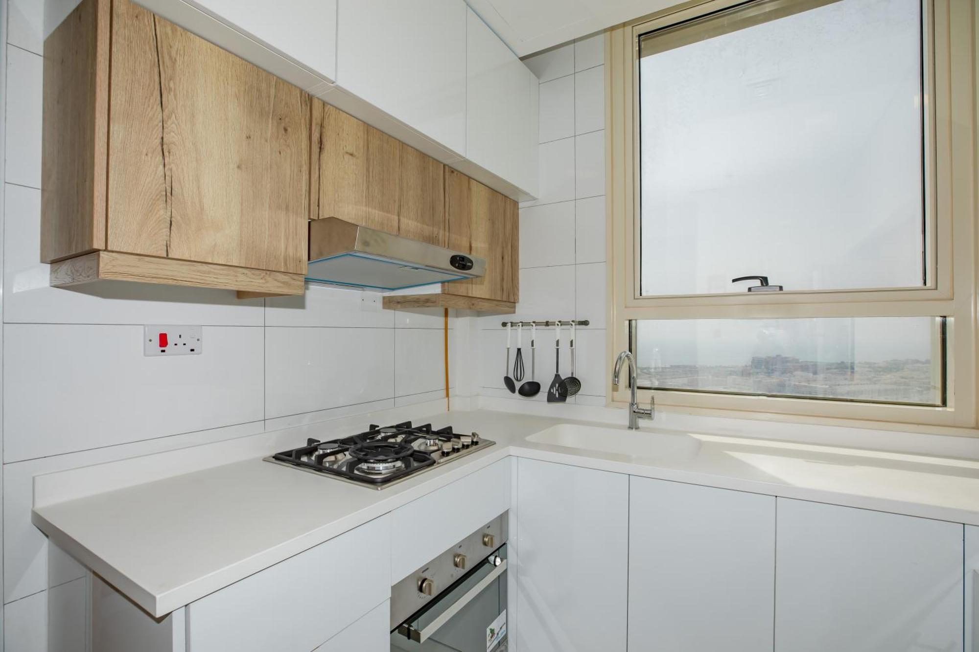 Platinum Coast Hotel Apartments Fujaira Camera foto A modern kitchen
